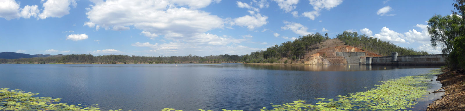 looking out at a dam and lake