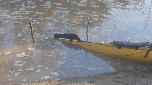 Showing rising water around a kayak