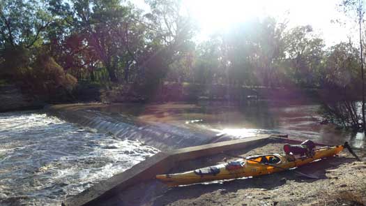 Fast flowing river over weir