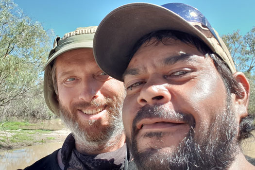 Selfie photo of two guys with beards