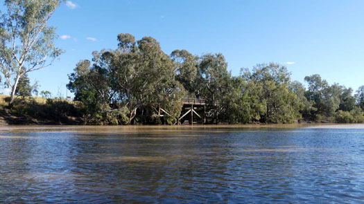 Old wooden structure at rivers edge