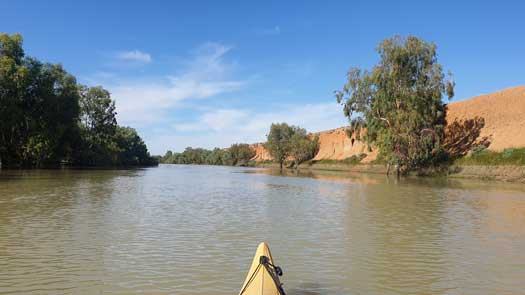 Coloured cliffs beside a river