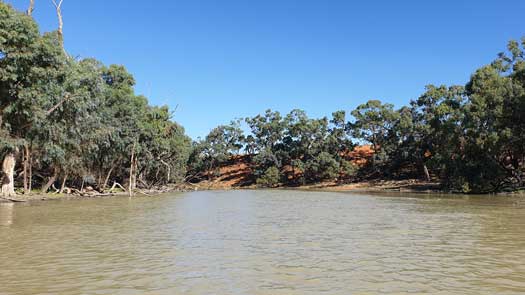 Red banks beside the river