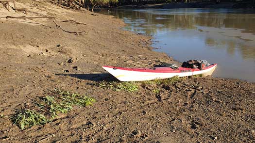 Kayak beside river