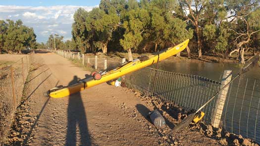 Kayak being moved of fences