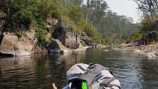 Deep creek surrounded by rocks