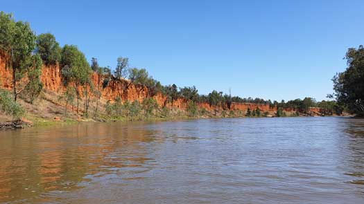 Bright cliffs beside a river