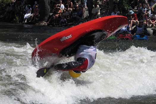 Kayaker flipping his boat